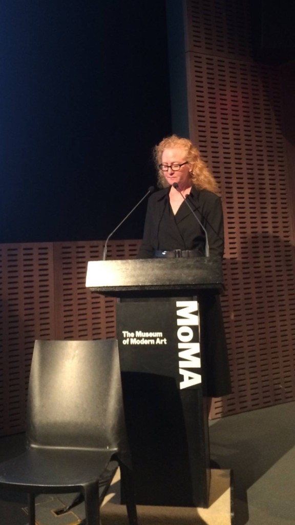 Anastasia Aukeman at the Museum of Modern Art podium